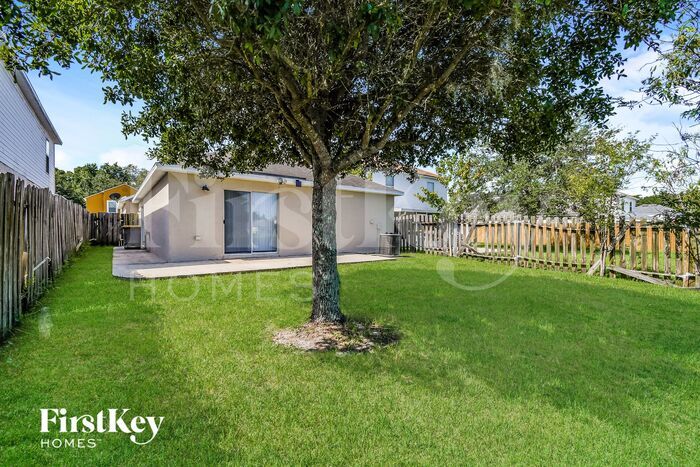 Building Photo - 6565 Gentle Oaks Dr