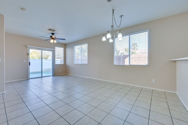 Building Photo - NW!! POOL!!!! GATED!!! Com. Park!!! Low Maintenance desert landscape front Yard. New Carpet!! Ups...