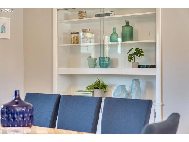Building Photo - Stylishly Updated Mid-Century Gem on a Qui...
