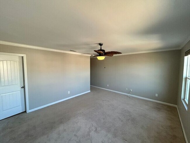 Building Photo - Spacious 5-Bedroom Home with Modern Amenit...