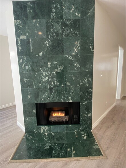 Floor To Ceiling Marble Gas Fireplace - Large Remodeled 2x2 Unit with Huge Patio