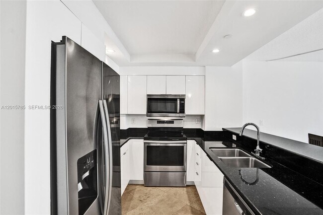 Building Photo - 6917 Collins Ave