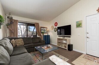 Building Photo - Upstairs 2 Bedroom 2 Bath Condo Available ...