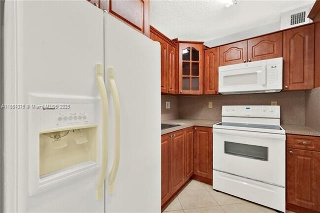 Building Photo - 1335 W 68th St