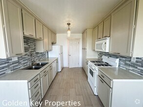 Building Photo - Beautiful upgraded 2BR condo in the Quail ...