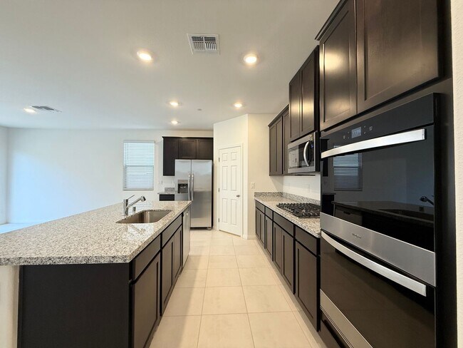 Building Photo - Modern Brand New Summerlin Home with 5 Bedrooms, Loft & Upgraded Finishes