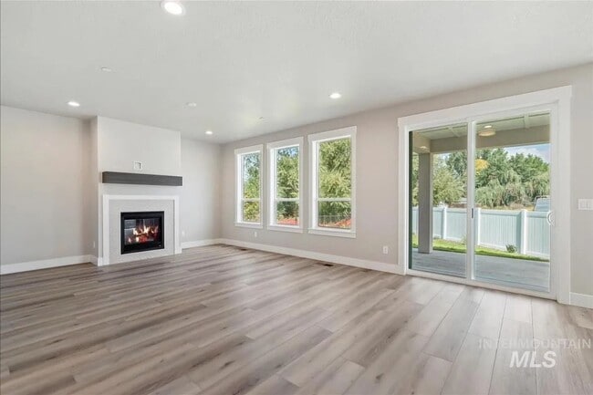 Building Photo - Brand New Spacious 4-Bedroom Home with 3-Car Garage, Granite Kitchen & Prime Middleton Location