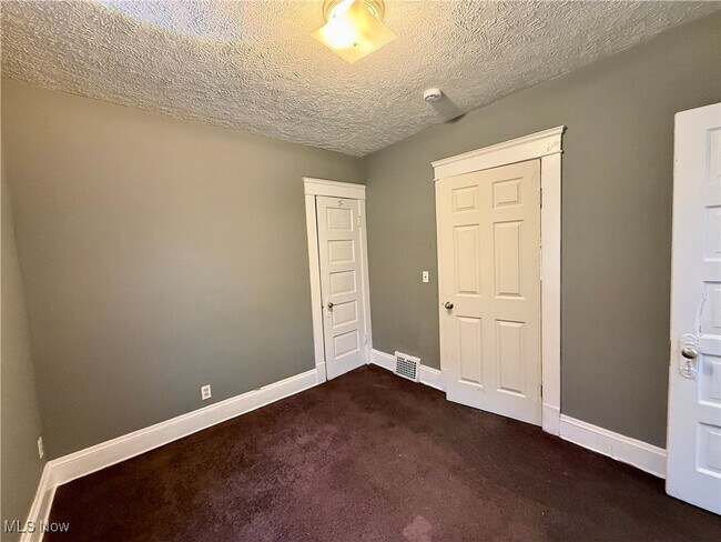 Building Photo - 9801 Raymond Ave