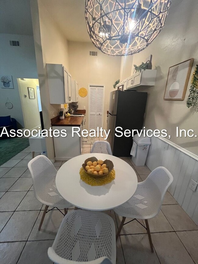 Building Photo - Beautifully furnished  2-Bedroom Duplex – ...