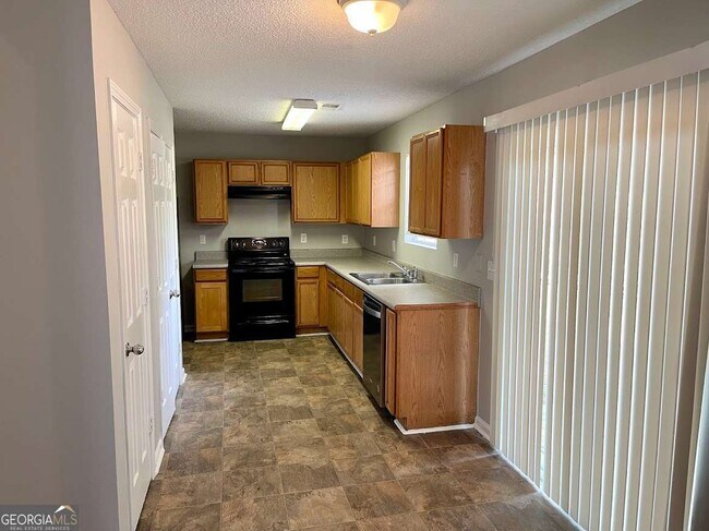 Building Photo - 7104 Merrywood Dr