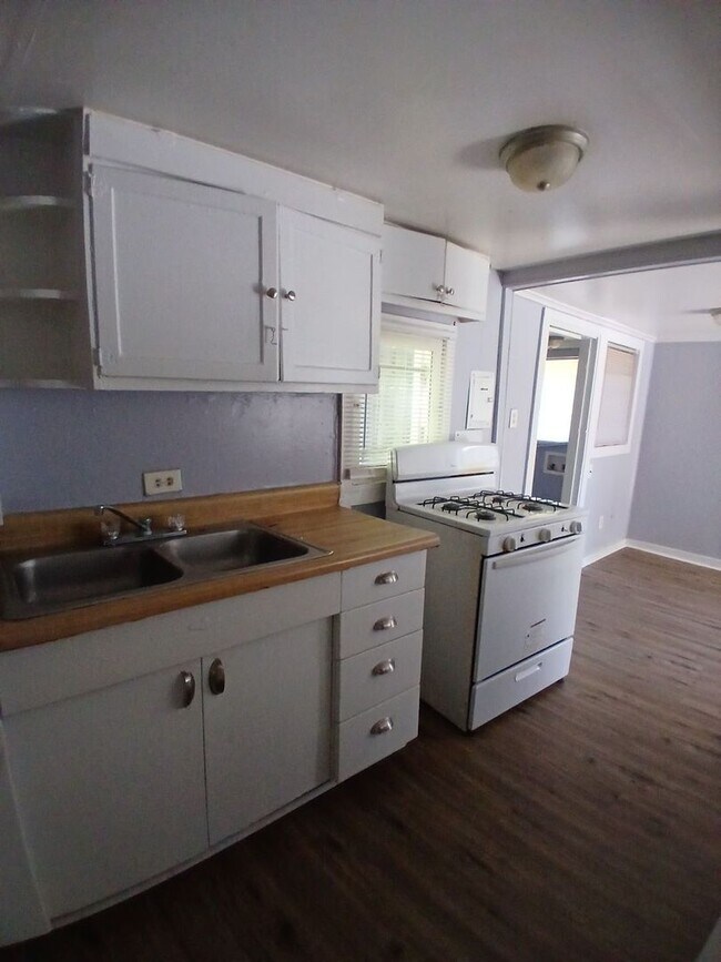 Building Photo - Ideally located 2-bedroom, 1.5-bathroom home nestled in a highly sought-after neighborhood - $99 ...