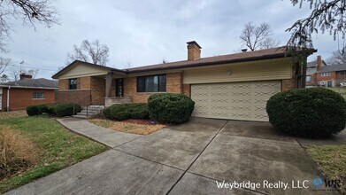 Building Photo - Charming Mid-Century 2BR Home with Sunroom, Fireplace & Fenced Yard
