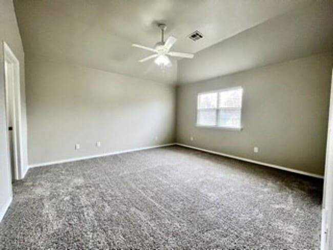 Building Photo - Spacious 3-Bed, 2.5-Bath Fourplex with Gar...