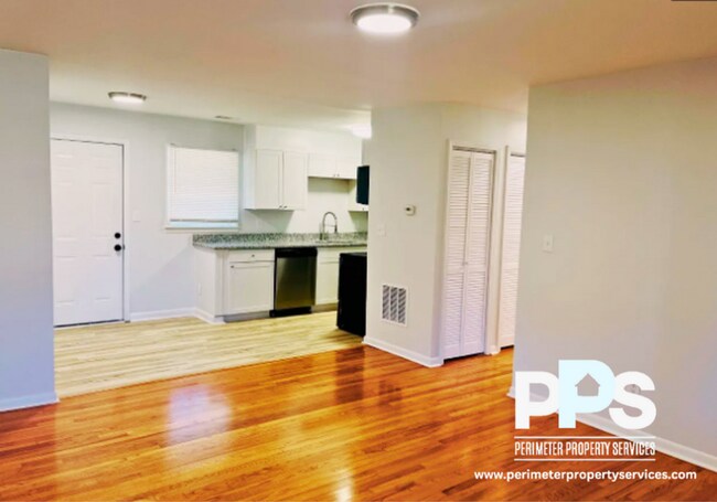 Building Photo - 6127-6129 E Fayetteville Dr