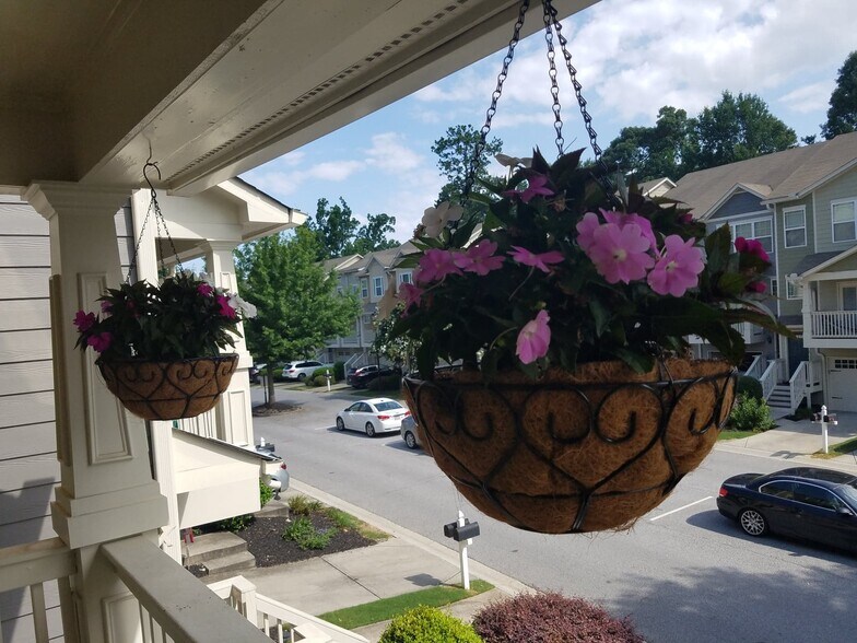 Have the option to hang beautiful flowers on the front balcony and add table and chairs if you'd like.B - 1256 Liberty Pkwy NW