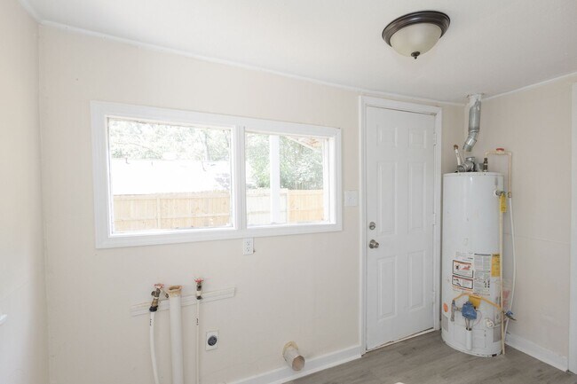 Building Photo - Move-In Special: Get 50% OFF Your First Month's Rent!