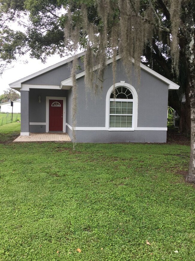 Building Photo - THREE BEDROOMS AND A TWO CAR GARAGE