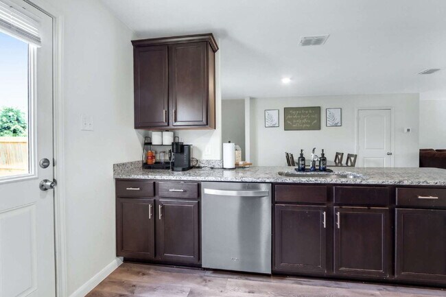 Building Photo - ASK ABOUT FREE APPLICATION FEES THROUGH AUGUST!  PRICE REDUCED!! Landscaping Included! Charming 3...