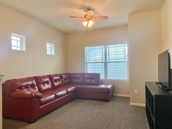 Building Photo - This charming two-story home, built in 2018, offers a spacious open floor plan perfect for casual...