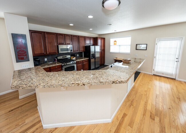 Building Photo - Downtown 3 Bedroom Townhome with 2 Car Garage