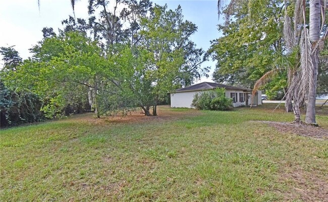 Building Photo - 12422 N Howard Ave