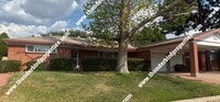 Building Photo - Desired NE location near Sandia High Schoo...
