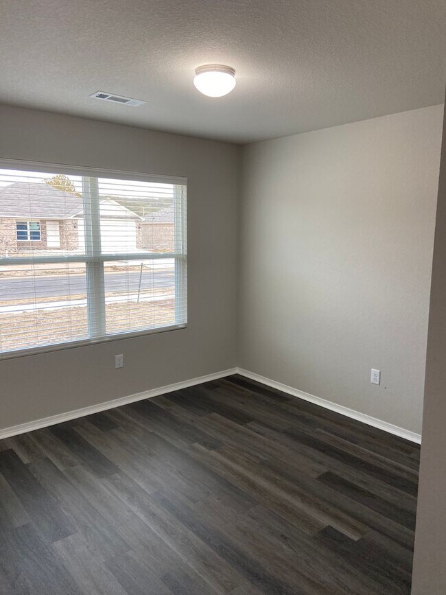 Building Photo - NOW AVAILABLE — Spacious Living in This 4-Bedroom | 2-Bath Conrad Court Home