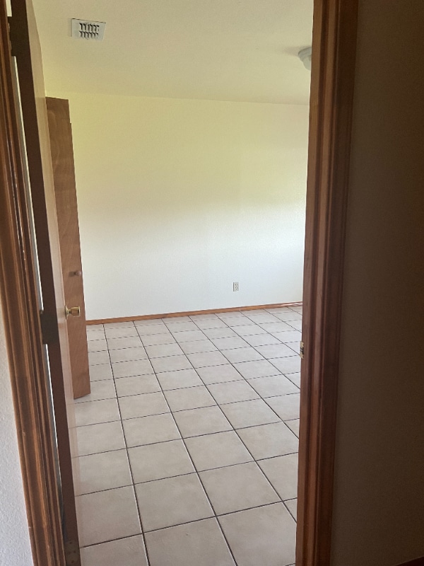Building Photo - 1000 Wild Rose Ln