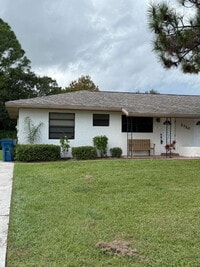 Building Photo - Cozy 2 bedroom duplex with screened patio