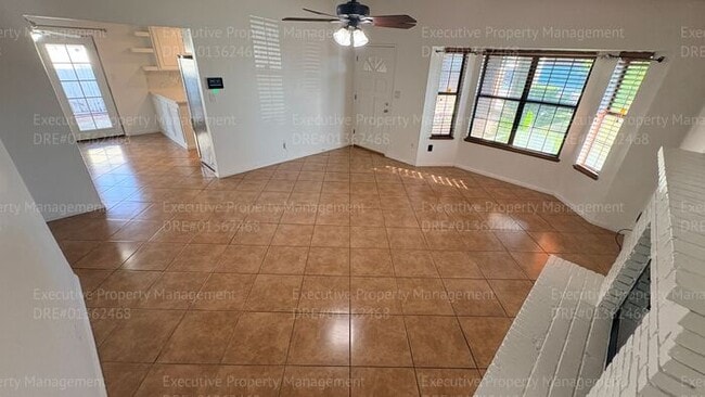 Building Photo - 3 bedroom 2 bathroom home on a corner lot with extra fenced parking.