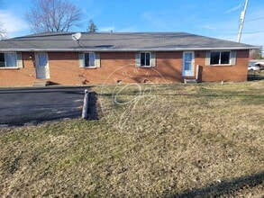 Building Photo - Spacious twin plex- 2 bed 1 bath - Lake Township-Lake Schools!