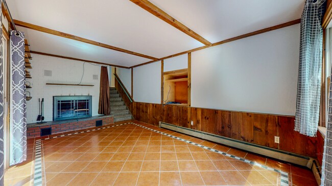 Building Photo - Spacious 3-Bedroom Split-Level with Firepl...