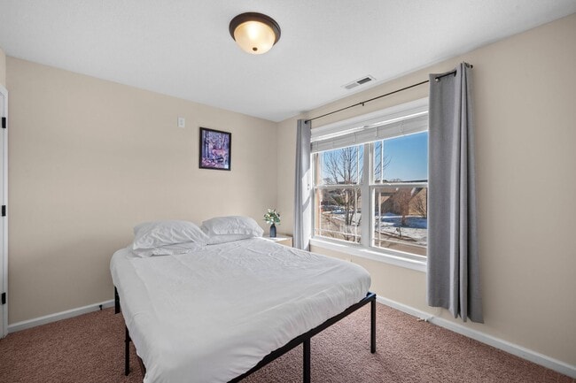 Building Photo - Spacious Living with a Private Primary Retreat!