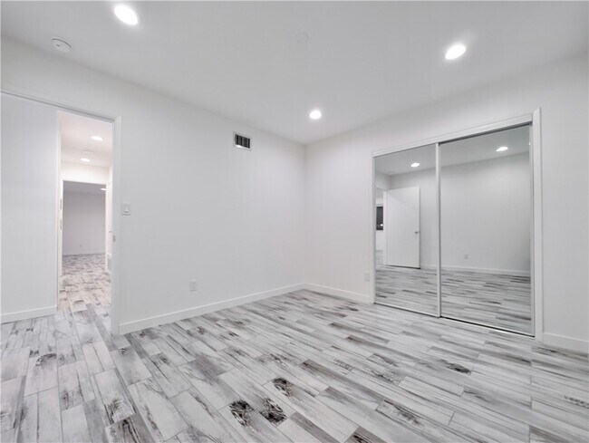 Building Photo - 12319 Woodley Ave