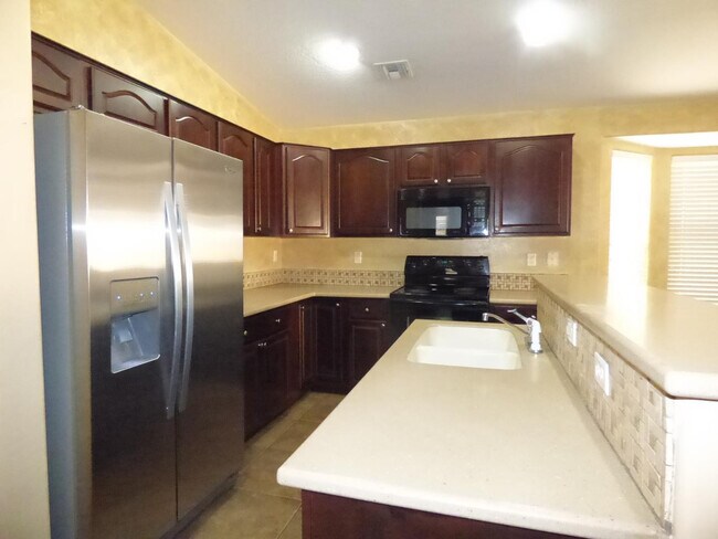 Building Photo - 14082 W Rosewood Dr