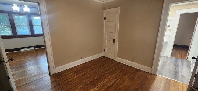 Building Photo - Fully fenced yard with stainless steel appliances including gas stove!