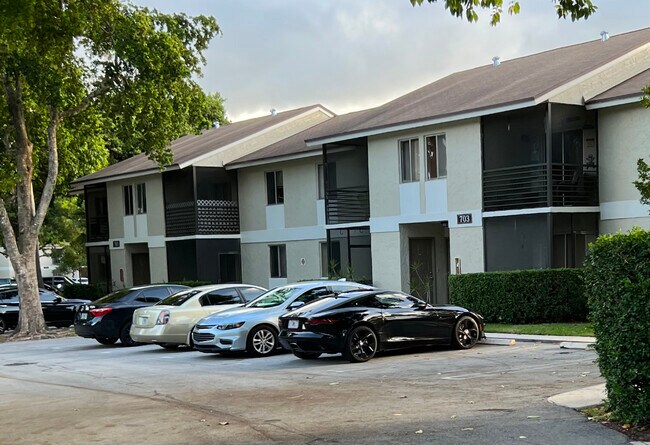 Parking at your door security on site. - 701 Gardens Dr