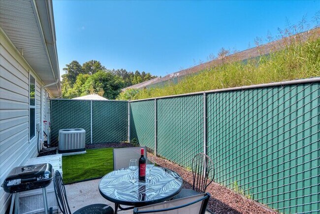 Building Photo - Evans Furnish Rental Master Golf Tournament Rental