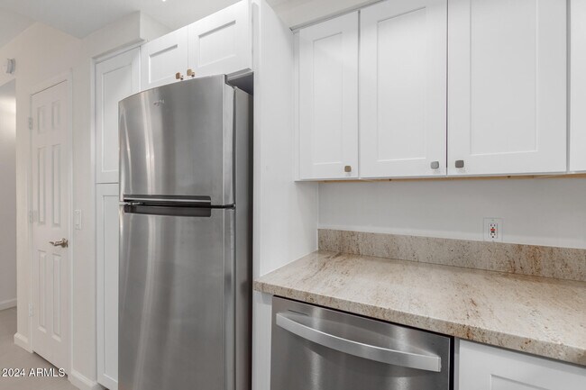 Building Photo - 9450 E Becker Ln