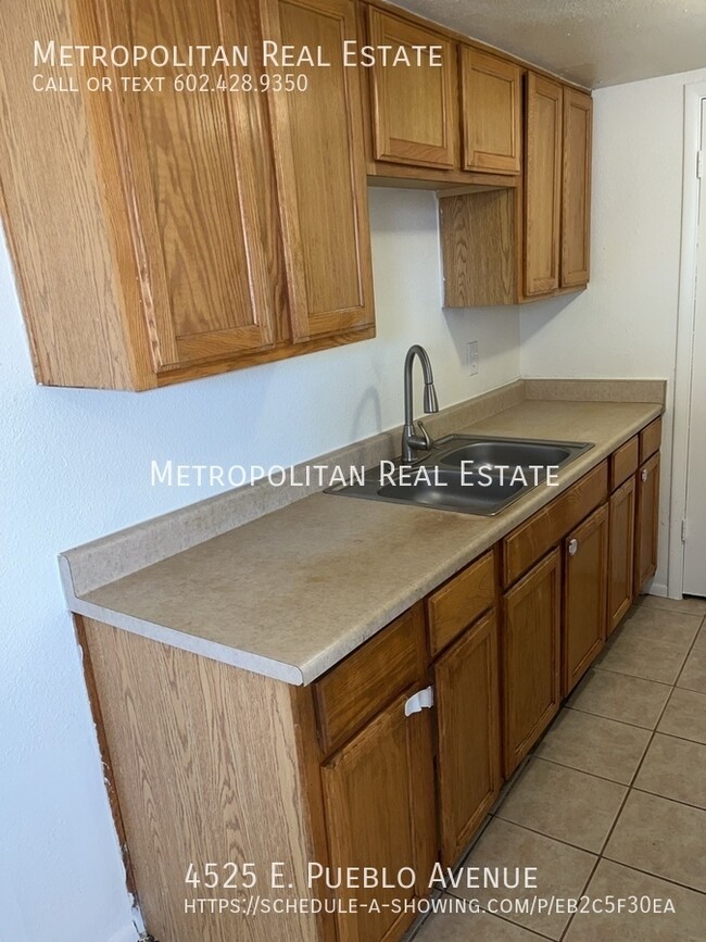 Building Photo - 4525 E Pueblo Ave