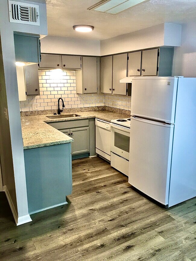 Granite Counter tops and Cabinets - 301 Foster Dr