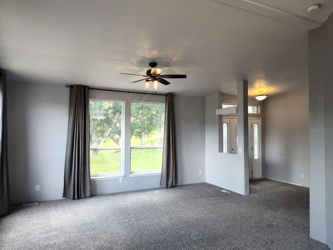 Building Photo - Spacious 3 Bed, 2 Bath Home with Shop & Stunning River Views – Clemans Addition
