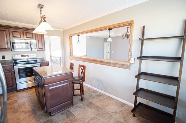 Building Photo - Pet Friendly Four Bedroom with Basement!