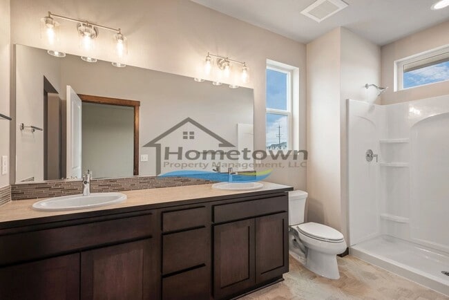 Building Photo - Woodbridge South Home with 4 Bedrooms and 3 Bathrooms in Post Falls build in 2021!