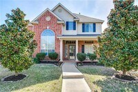 Building Photo - Immaculate home on a beautifully landscaped lot, tandem garage, plenty of storage!