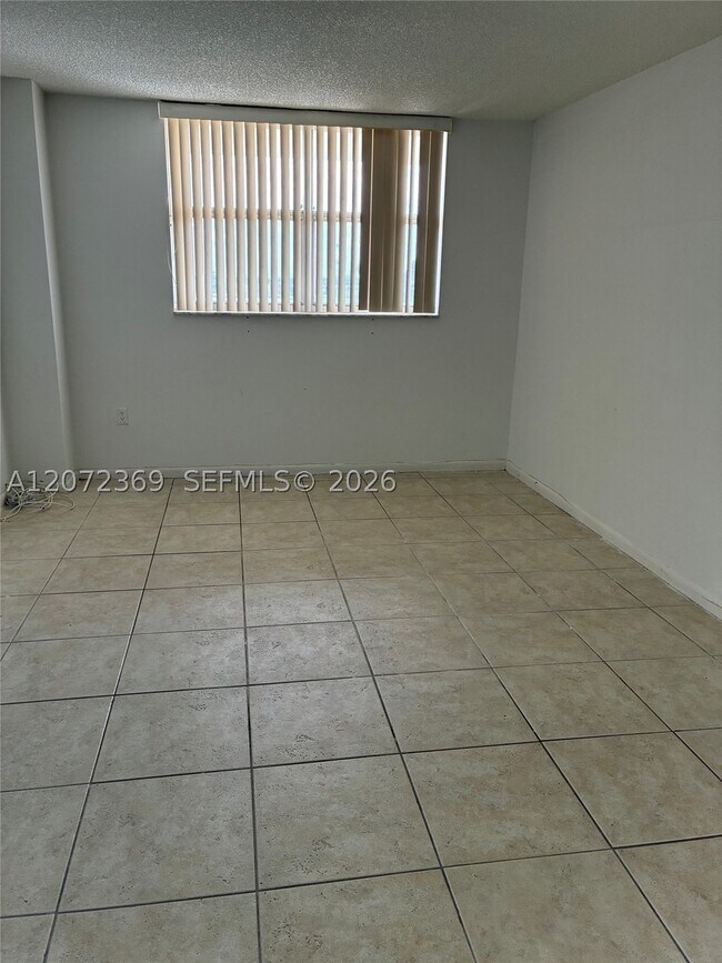 Building Photo - 4675 W 18th Ct