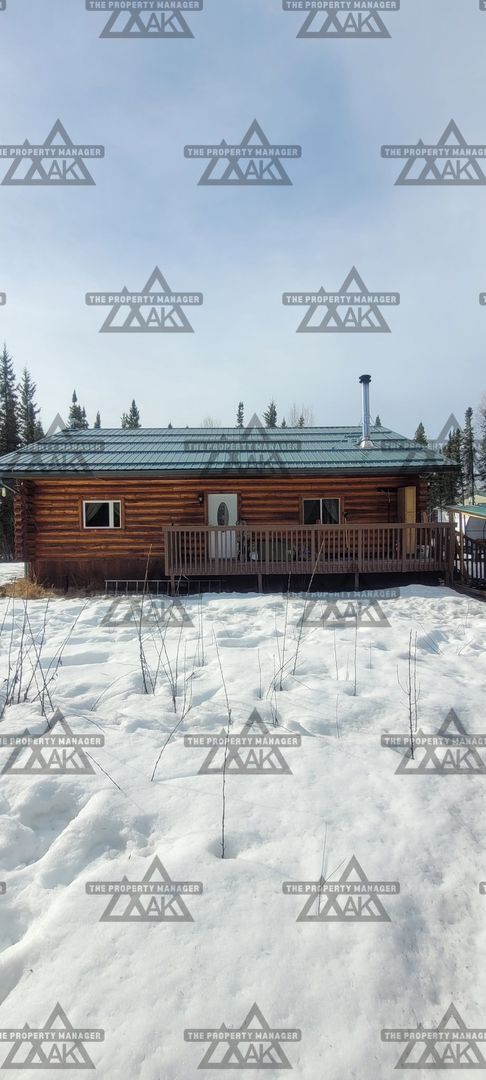 Building Photo - Charming Cabin – 2BR Home with Wood Stove - Dog Friendly