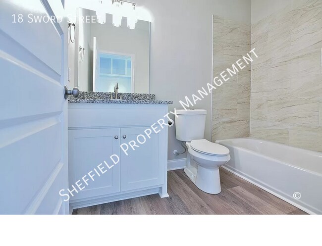 Building Photo - 18 Sword St