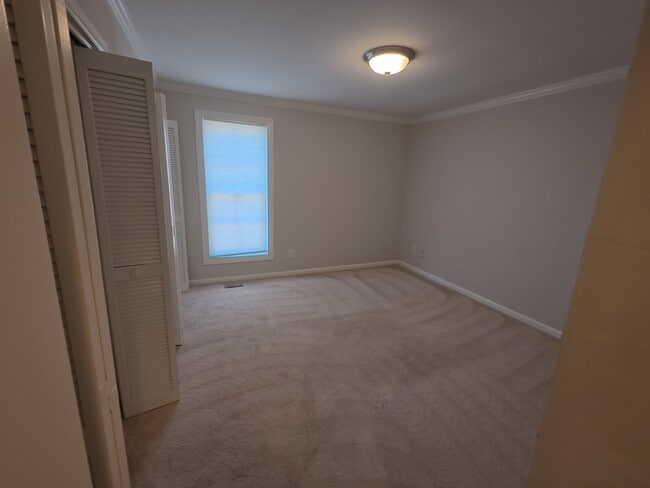 Building Photo - Terrific Rancher with Vaulted Ceiling in Meredith Woods.