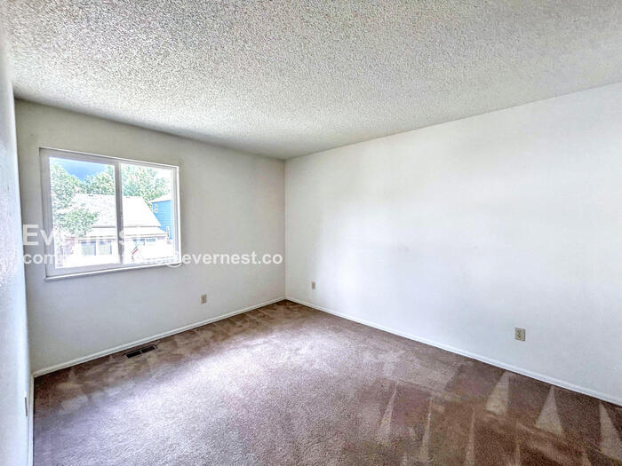 Building Photo - 6659 Gambol Quail Dr E